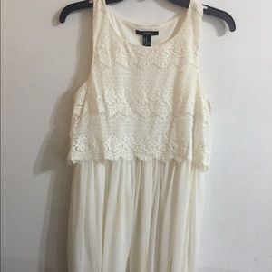 Woman’s off white color dress with lace